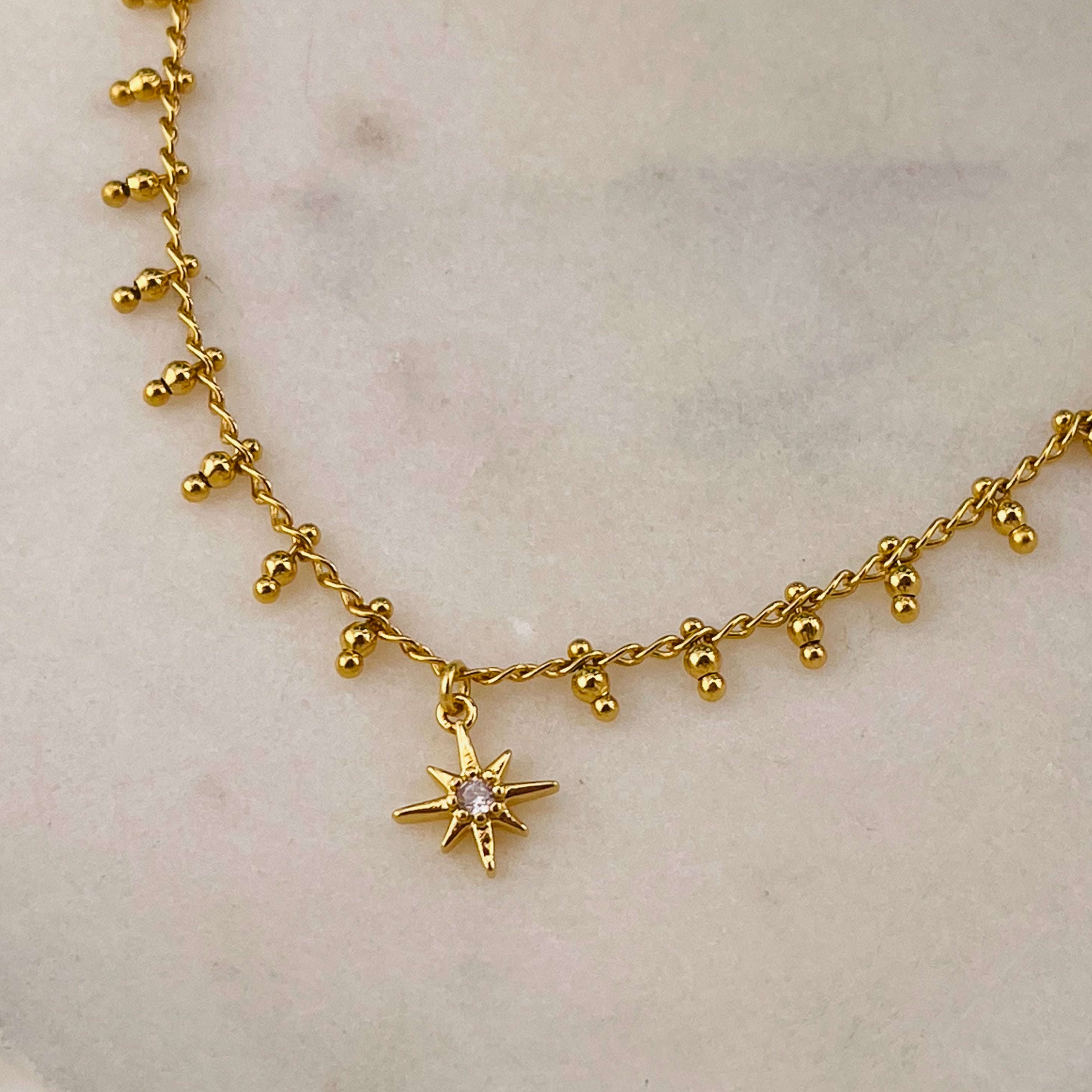 Fusskettchen mit Goldkugeln und Polarstern-Anhänger Gold Cody