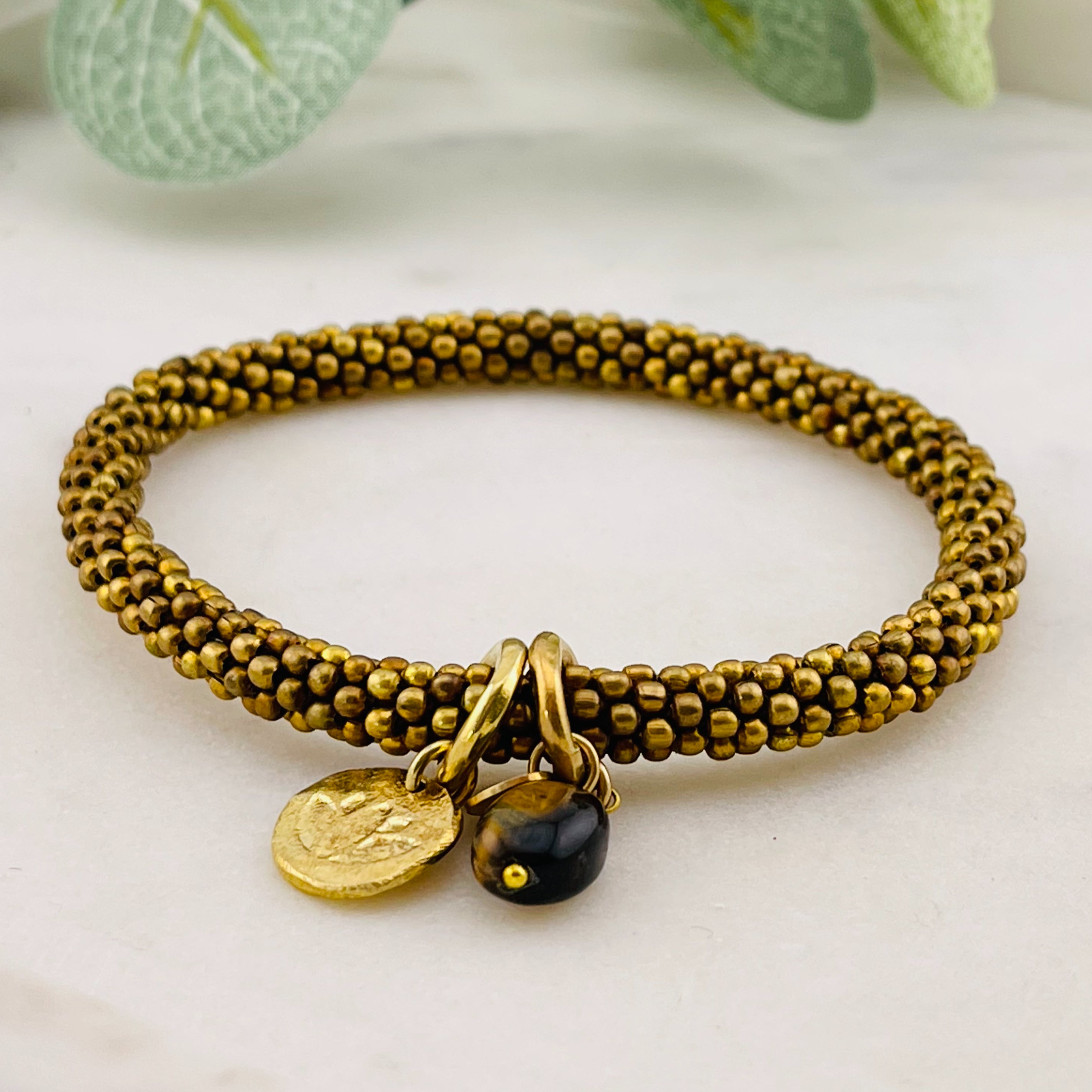 Messingperlen Armband "Jacky Tiger Eye Lotus"