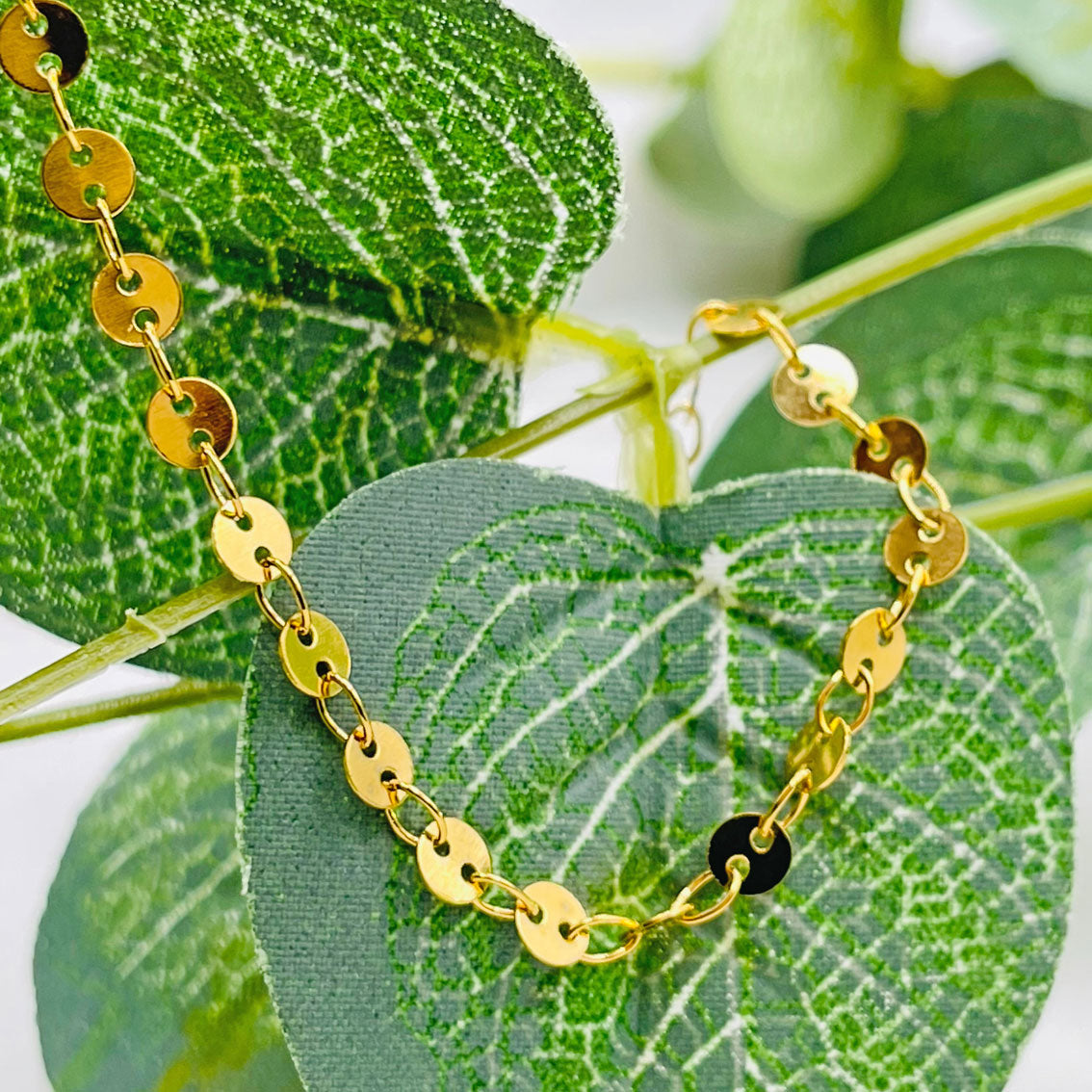 Gold-Plättchen Armkette Bairo Clama